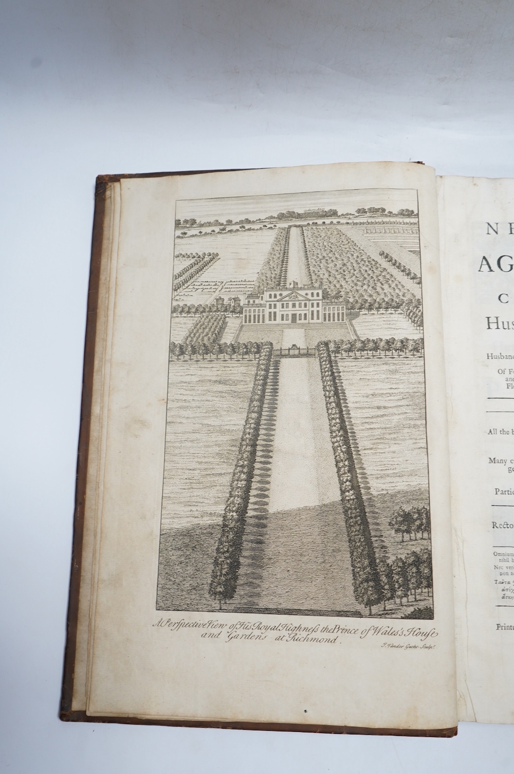 Laurence, John - A New System of Agriculture. Being a complete body of husbandry and gardening....1st edition. frontis. 2 plates, engraved text illus., head and tailpiece decorations; contemp. blind decorated panelled ca